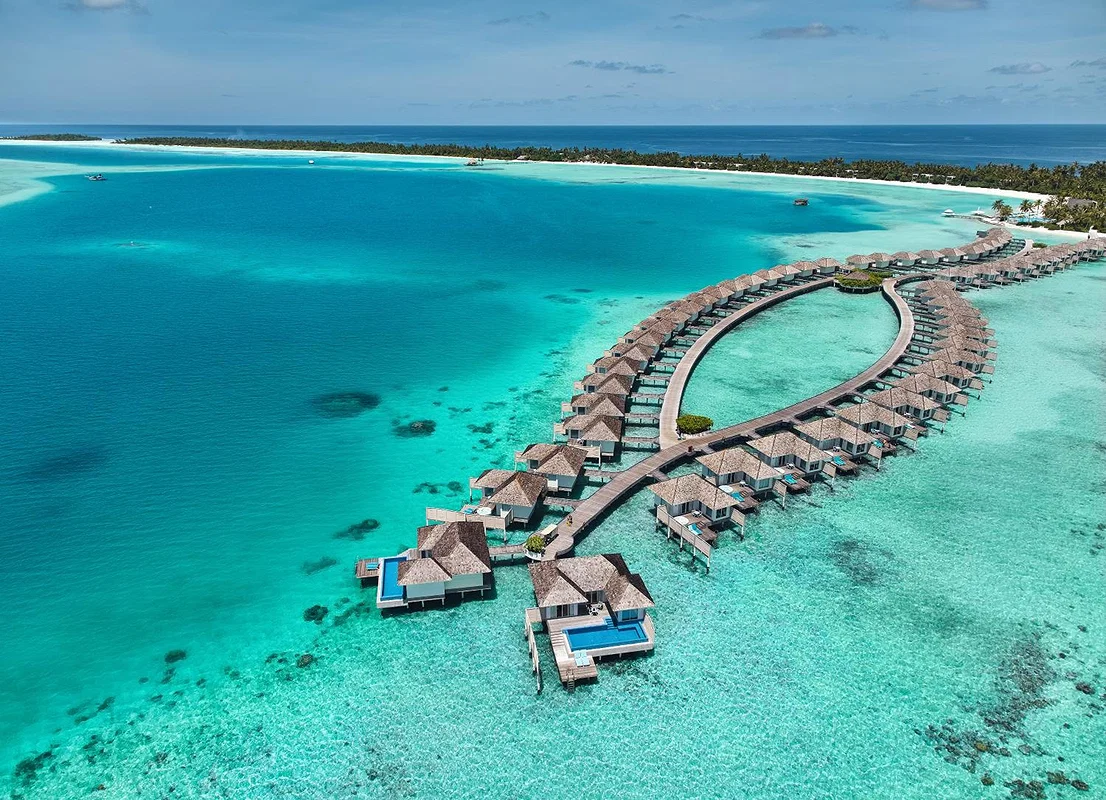 Private deck of a Maldives overwater villa with direct lagoon access